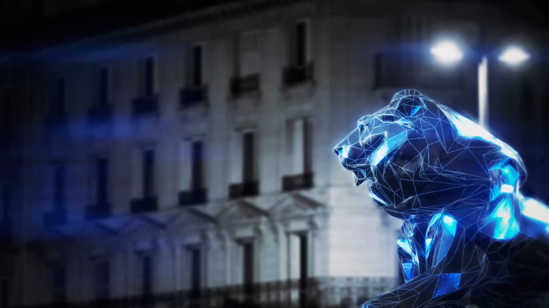 The lion transforms into a glowing blue wireframe against a Paris street at night.