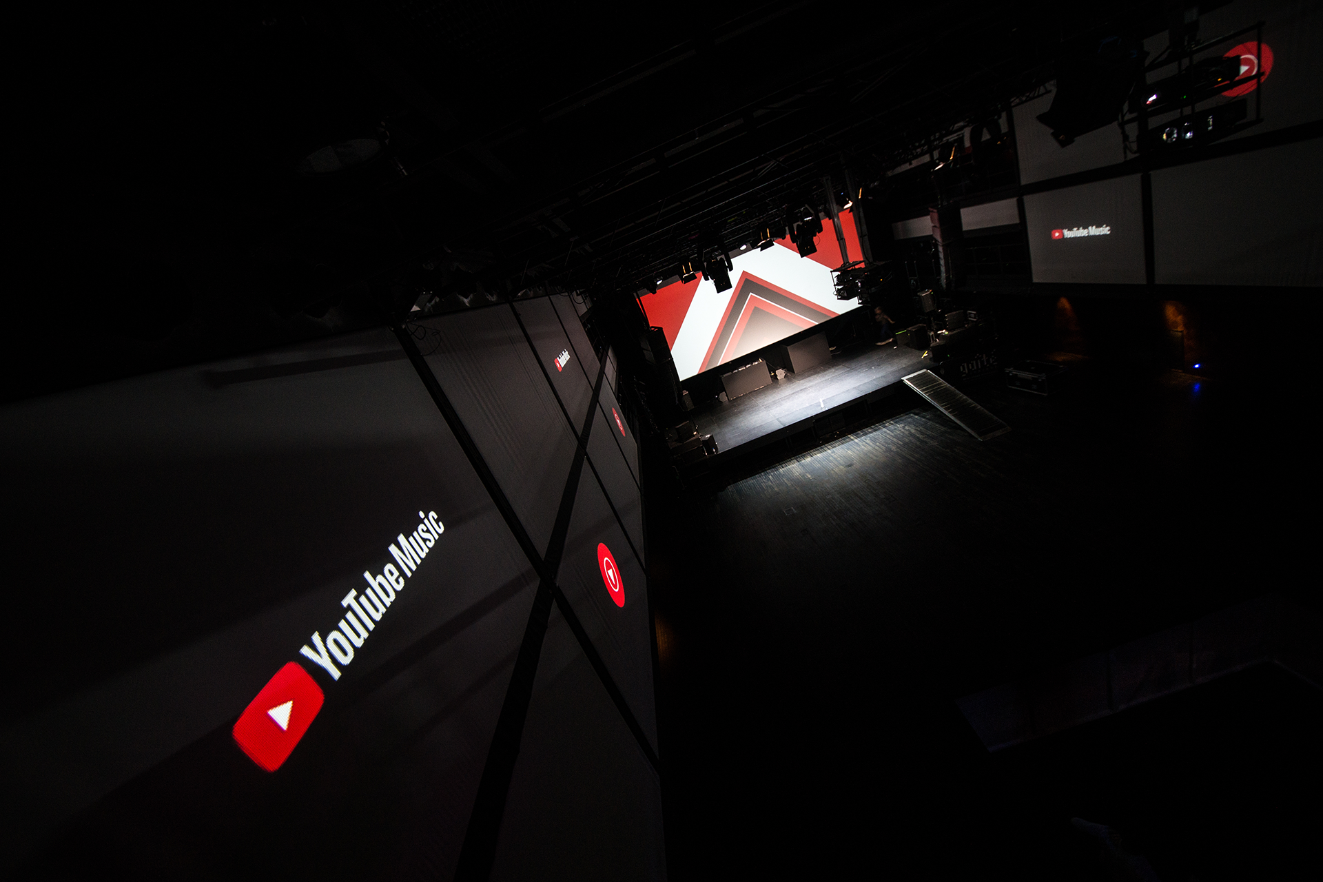 The stage and side-wall projections at La Ga&icirc;t&eacute; Lyrique before the YouTube Music launch.