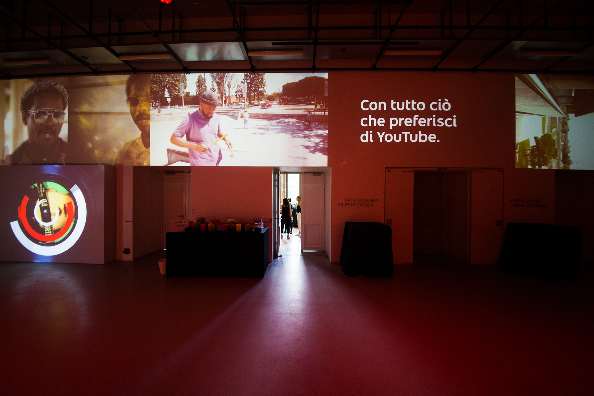 Music videos, messages and vinyl imagery projected above the foyer doors.