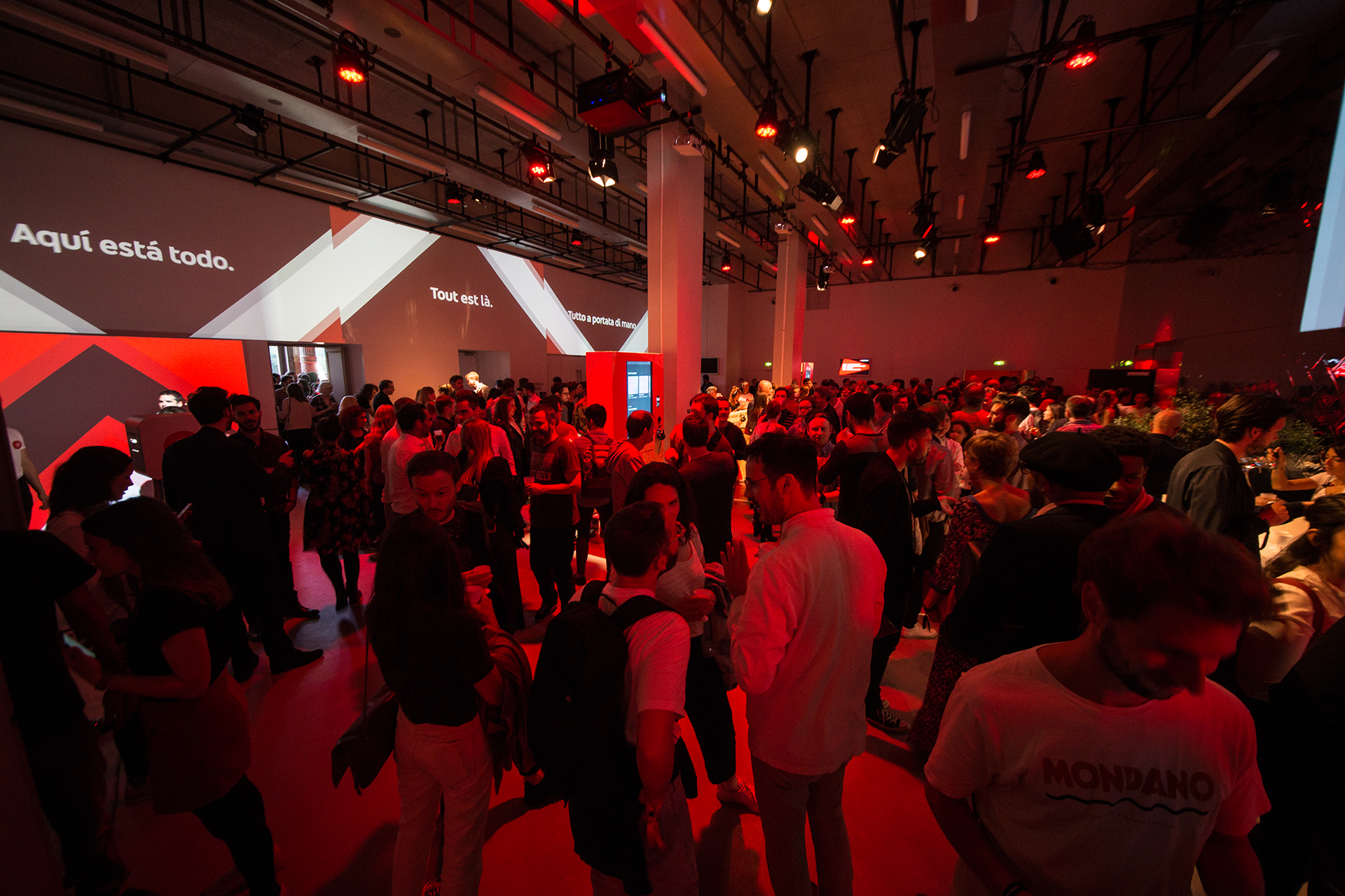 Guests in the foyer beneath the YouTube Music projections.
