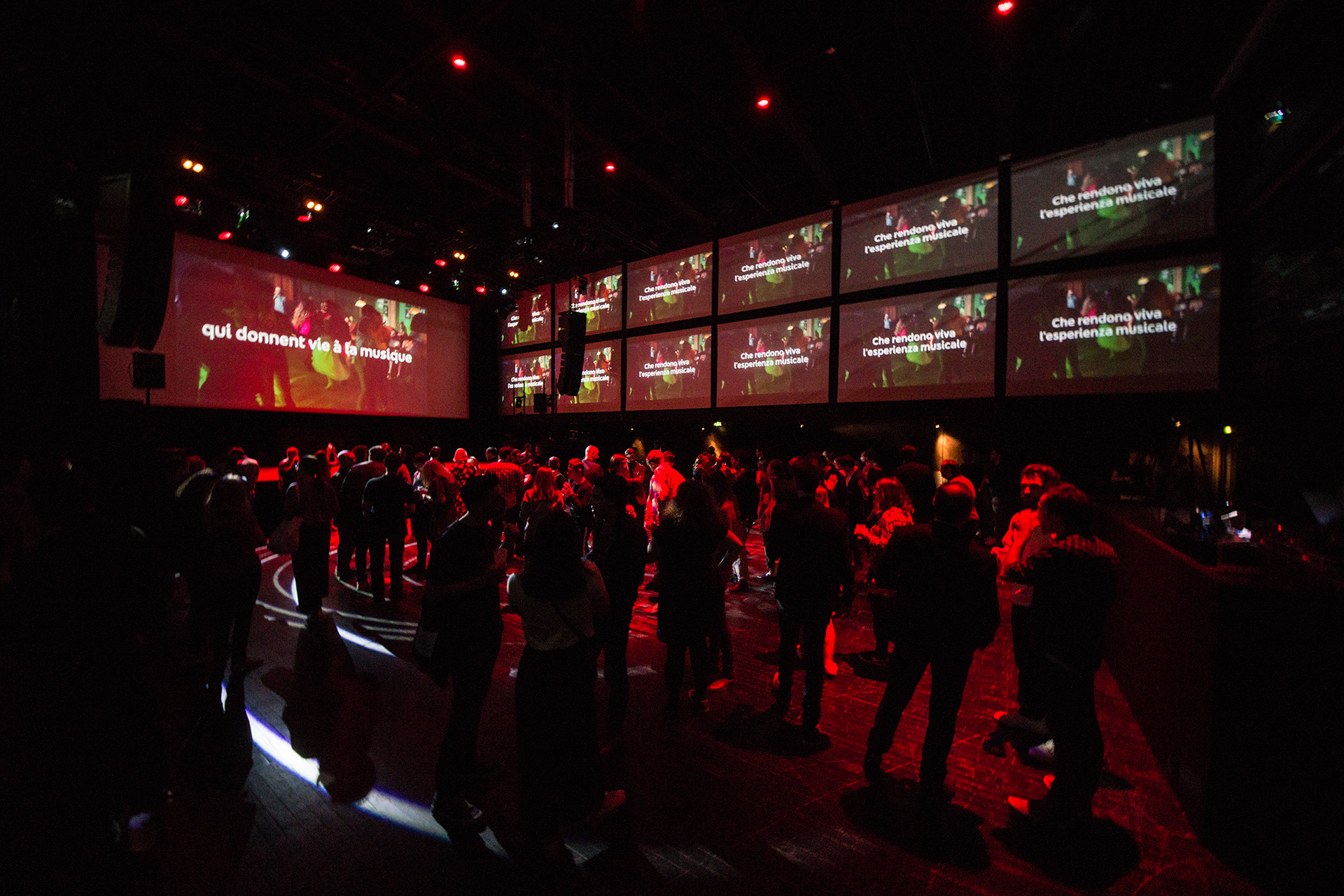 Guests entering the large room surrounded by the launch visuals.